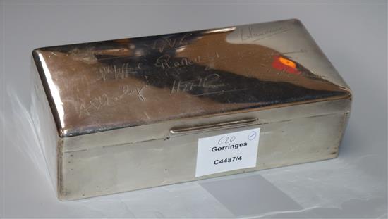 A George V silver cigarette box, 18.8cm.